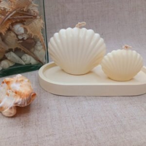 Velas em formato de concha, feitas artesanalmente em cera vegetal